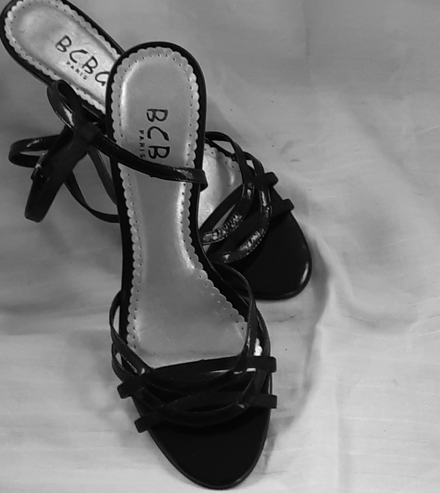 BCBG Paris black patent leather strapped heals